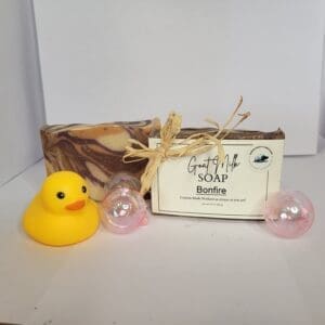 Goat milk soap with rubber duck and bubbles.