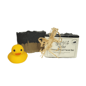 Yellow duck with charcoal soap bar.