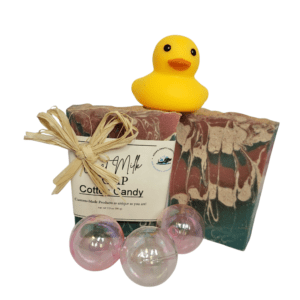 Rubber duck with soap and bath bombs.