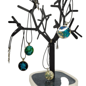 Tree-shaped stand displaying colorful necklaces.