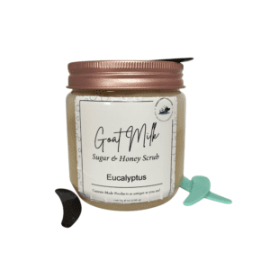 Goat milk eucalyptus scrub jar with spoons.