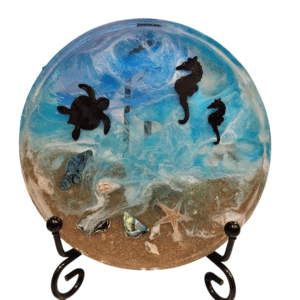Ocean-themed glass art with sea creatures.