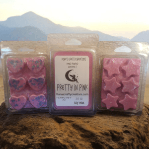 Pink wax melts with mountain background.